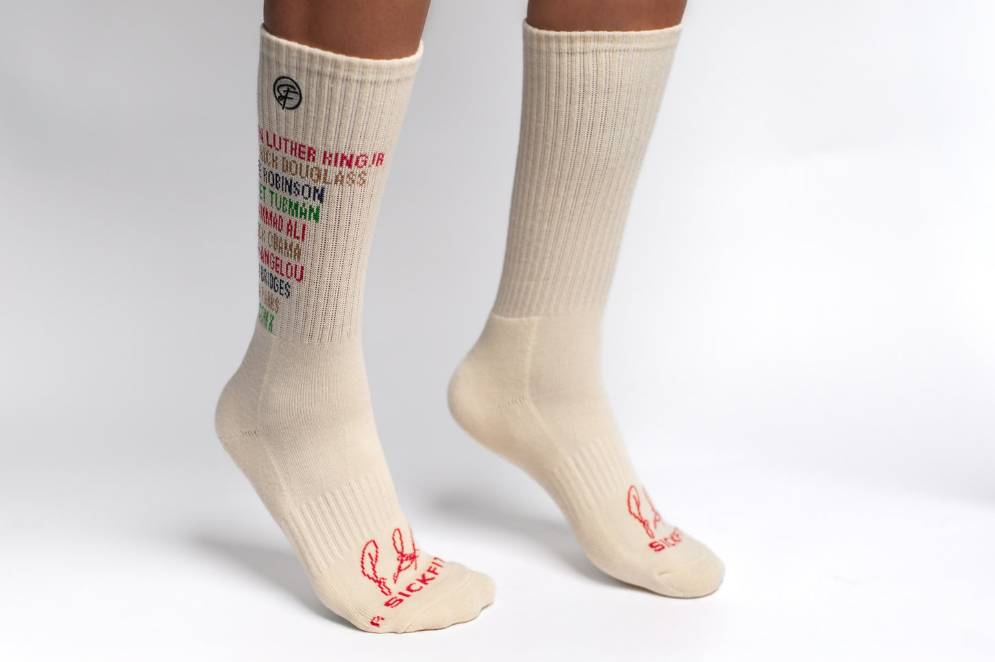 Creme crew compression socks with a list of historical black figures.