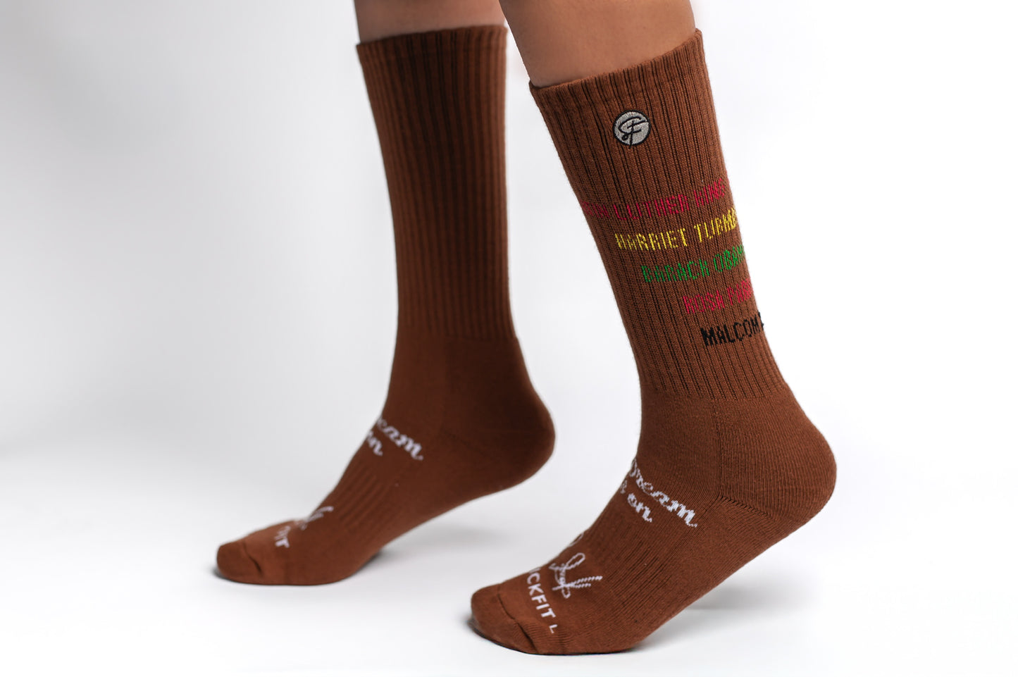 Brown crew compression socks with a list of historical black figures.