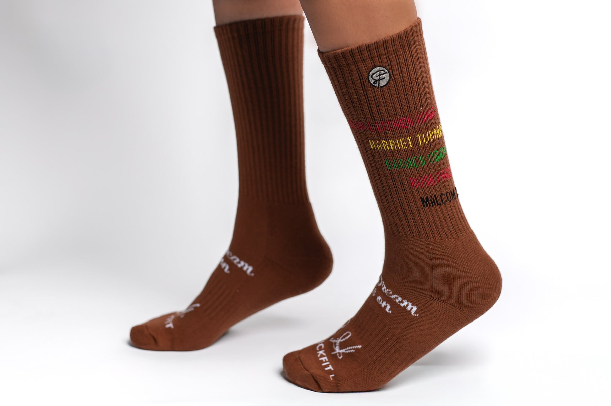 Brown crew compression socks with a list of historical black figures.