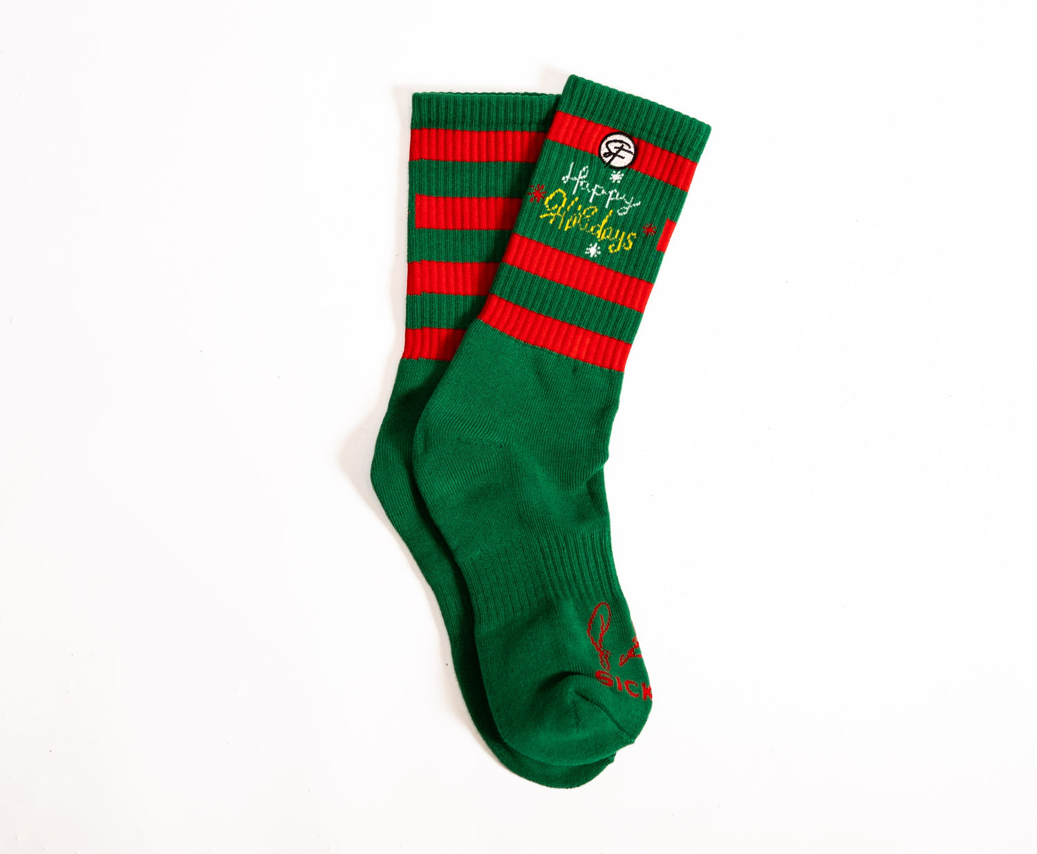 Green socks with red stripes and 'Happy Holidays' text on a white background