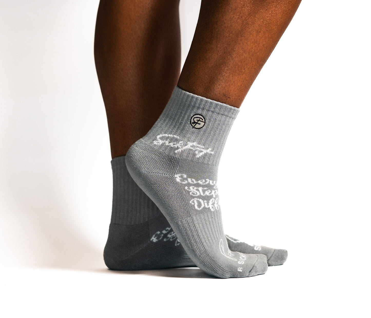 Gray calf socks with text on a white background