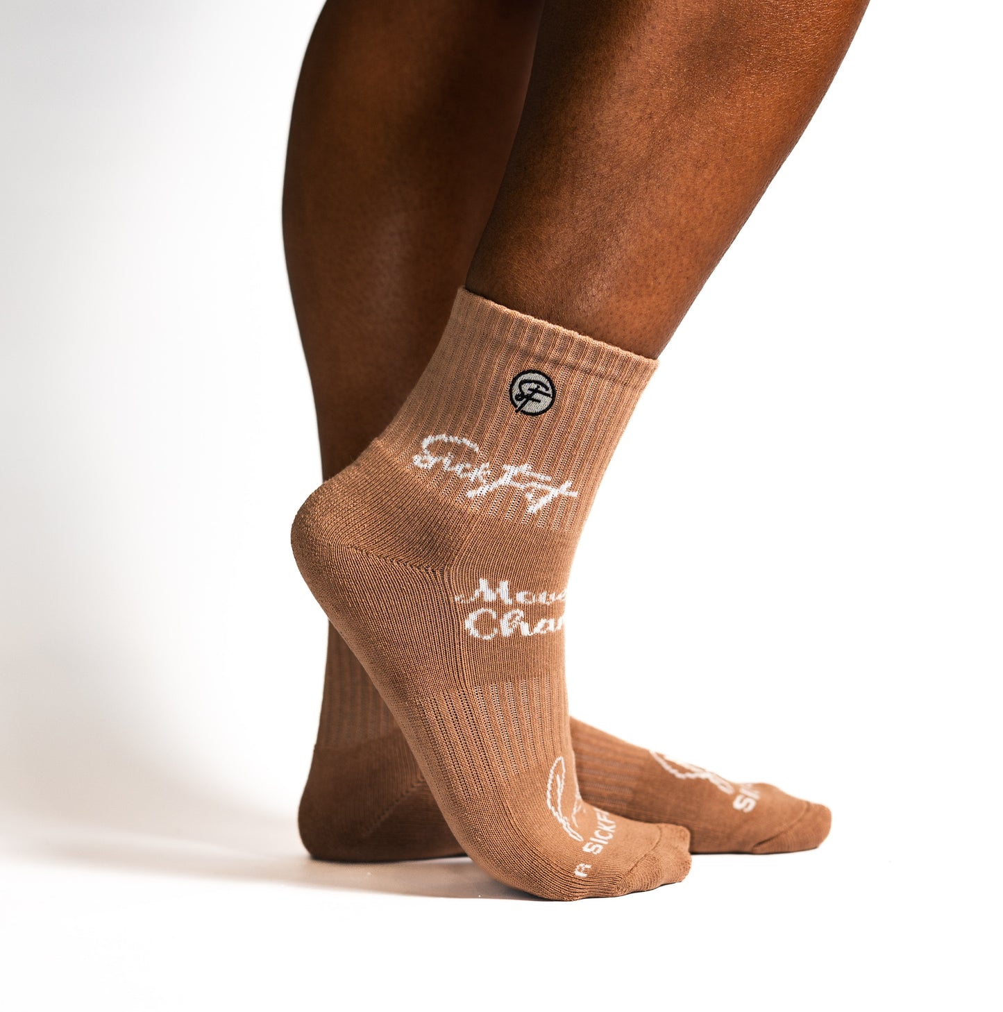 Brown calf socks with white text that says "SickFit" on a white background