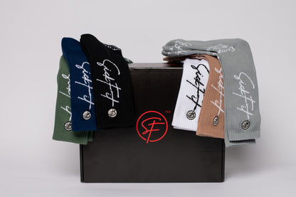 Box of crew compression socks with a brand logo on a white background