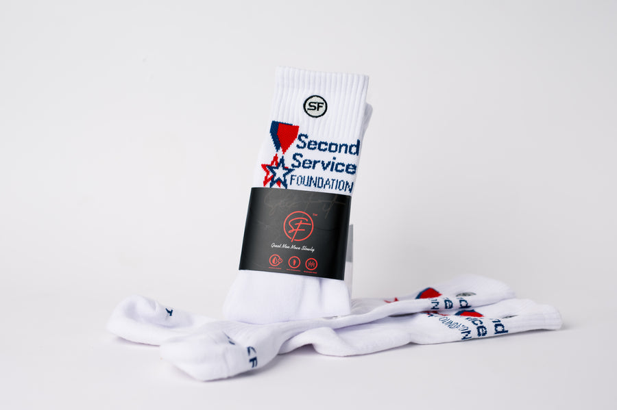 White Sickfit crew compression socks with blue text "Second Service Foundation"